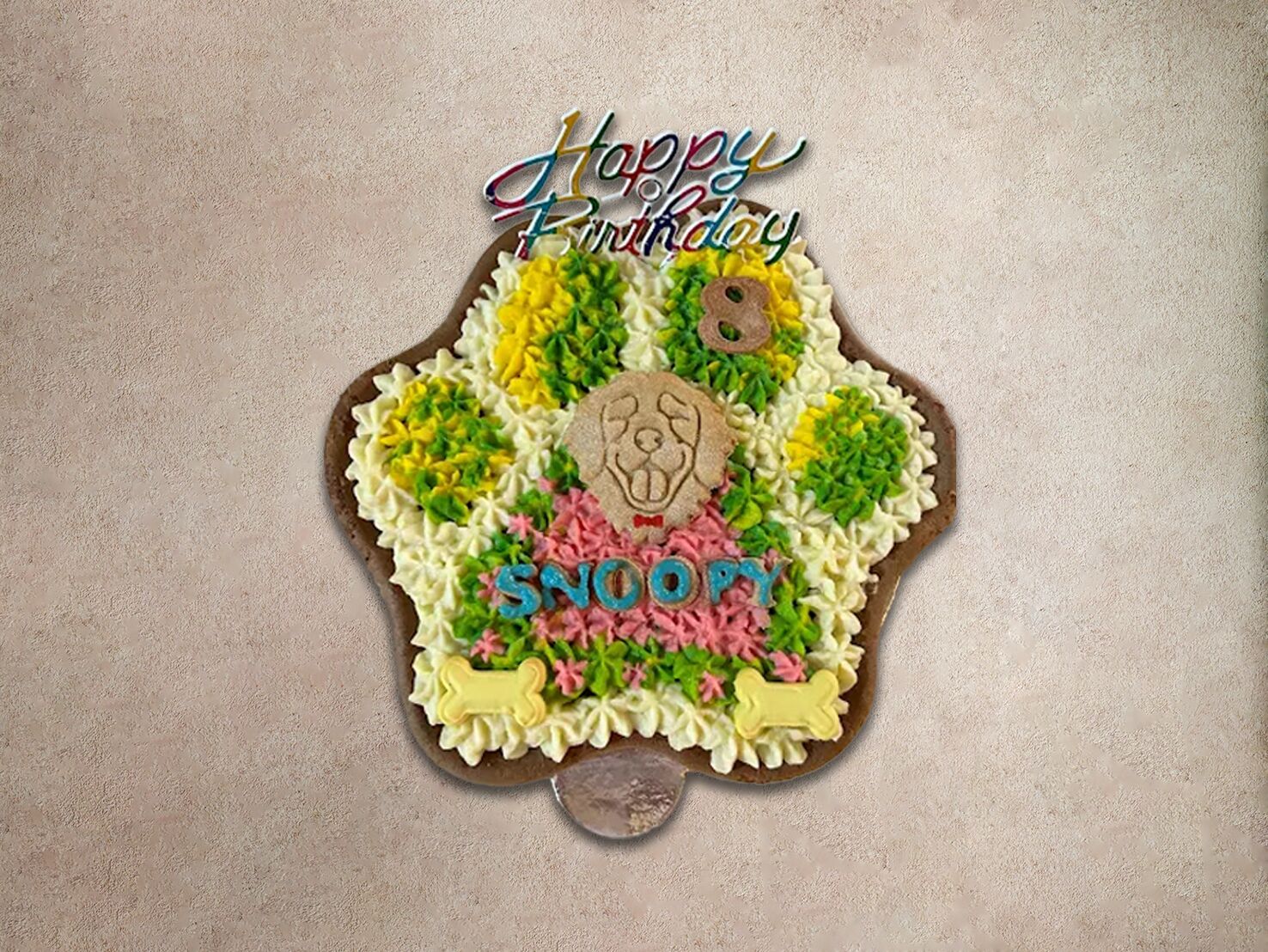 colorful paw print cake